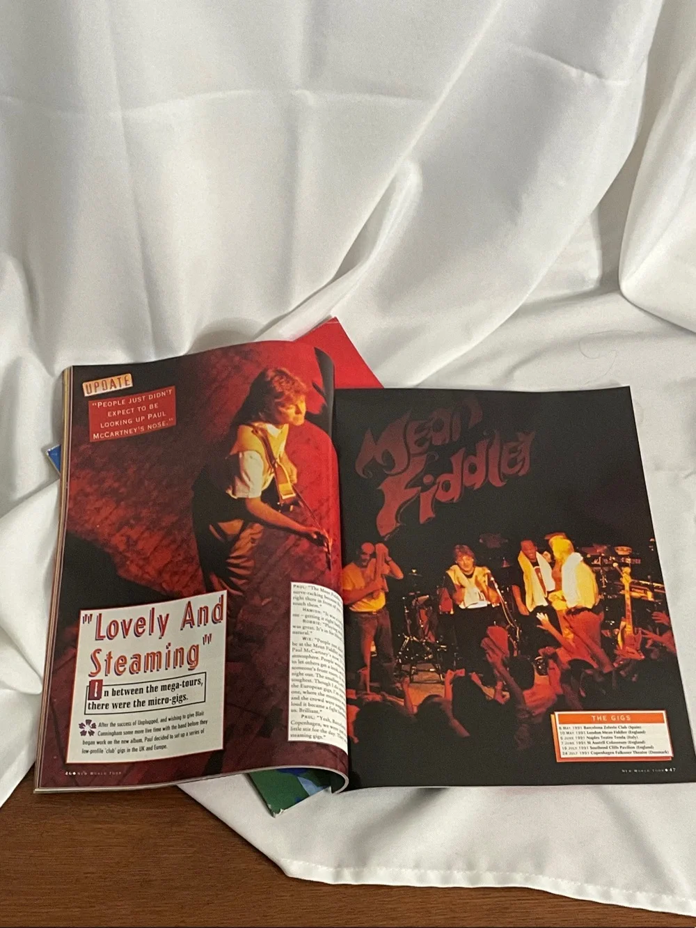 Vintage Paul McCartney World Tour Concert Magazine Spread with Bold Red Imagery
